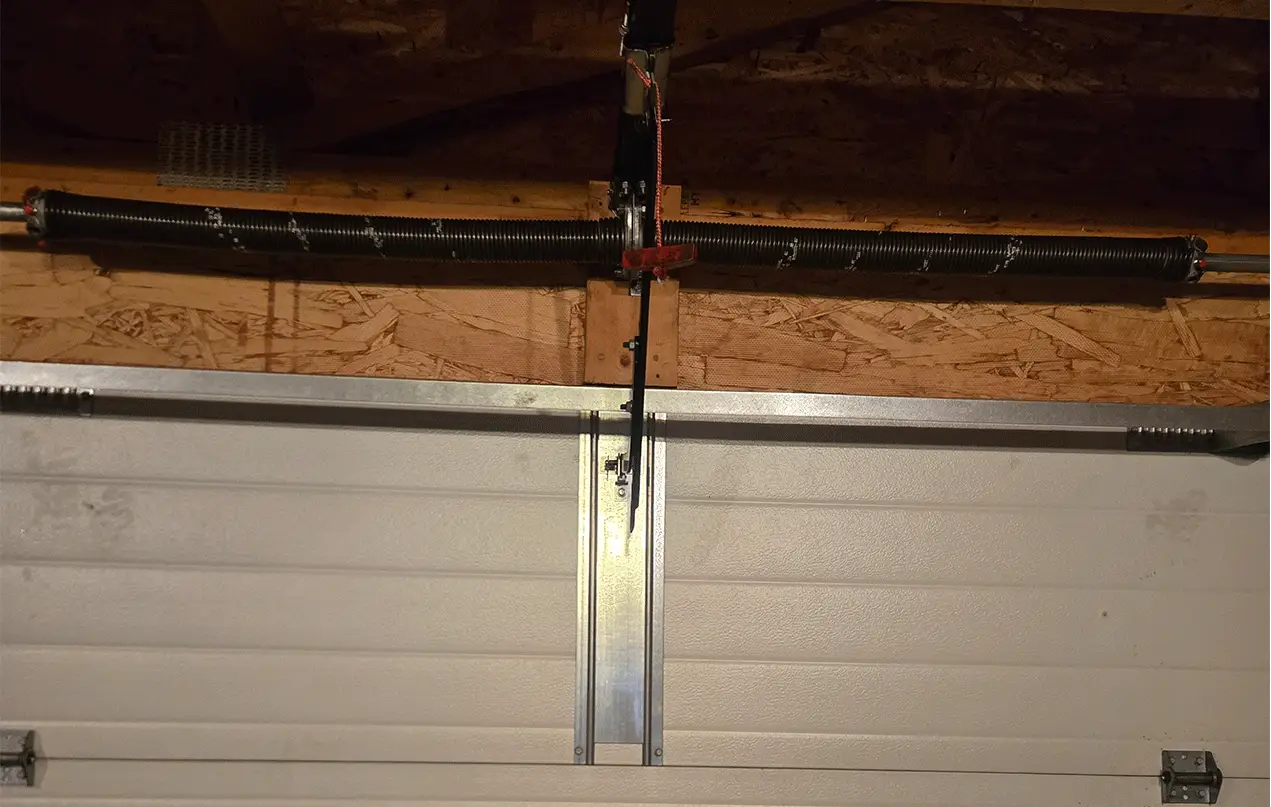 After: Broken spring & cables replaced