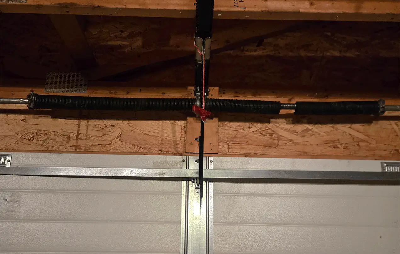 Before: Broken spring & cables replaced